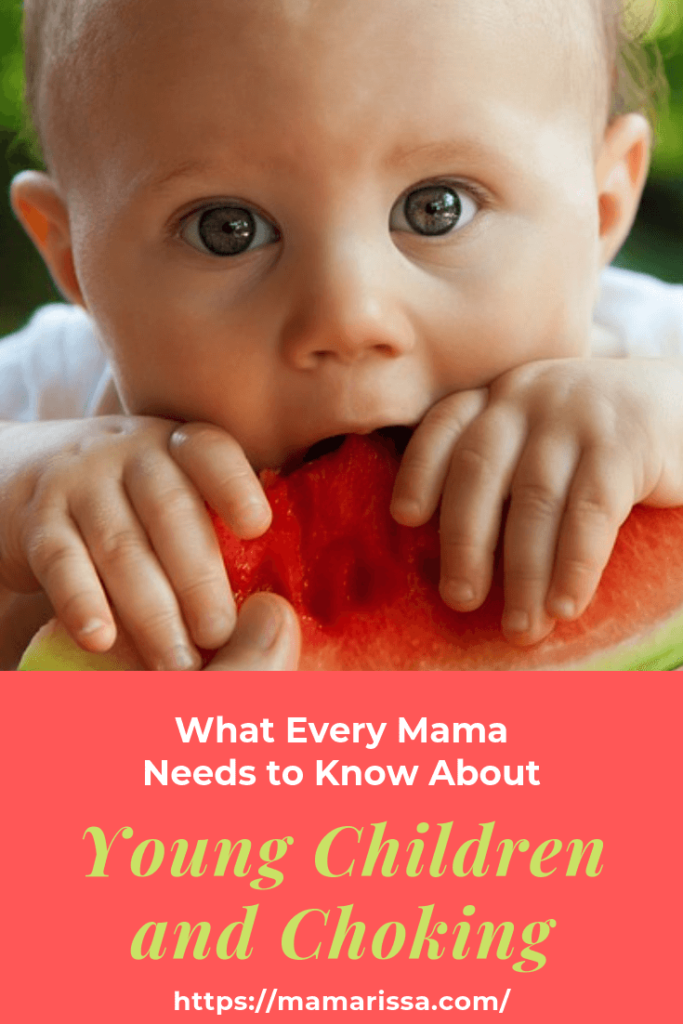Baby eating watermelon.