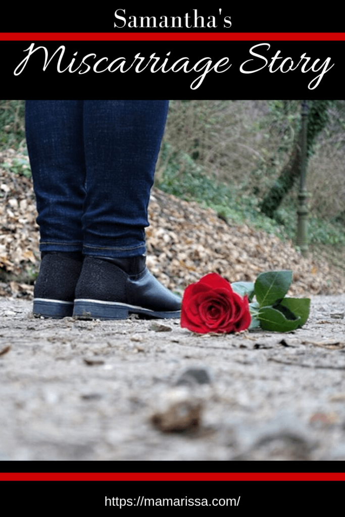 Woman standing by rose on the ground signifying miscarriage.