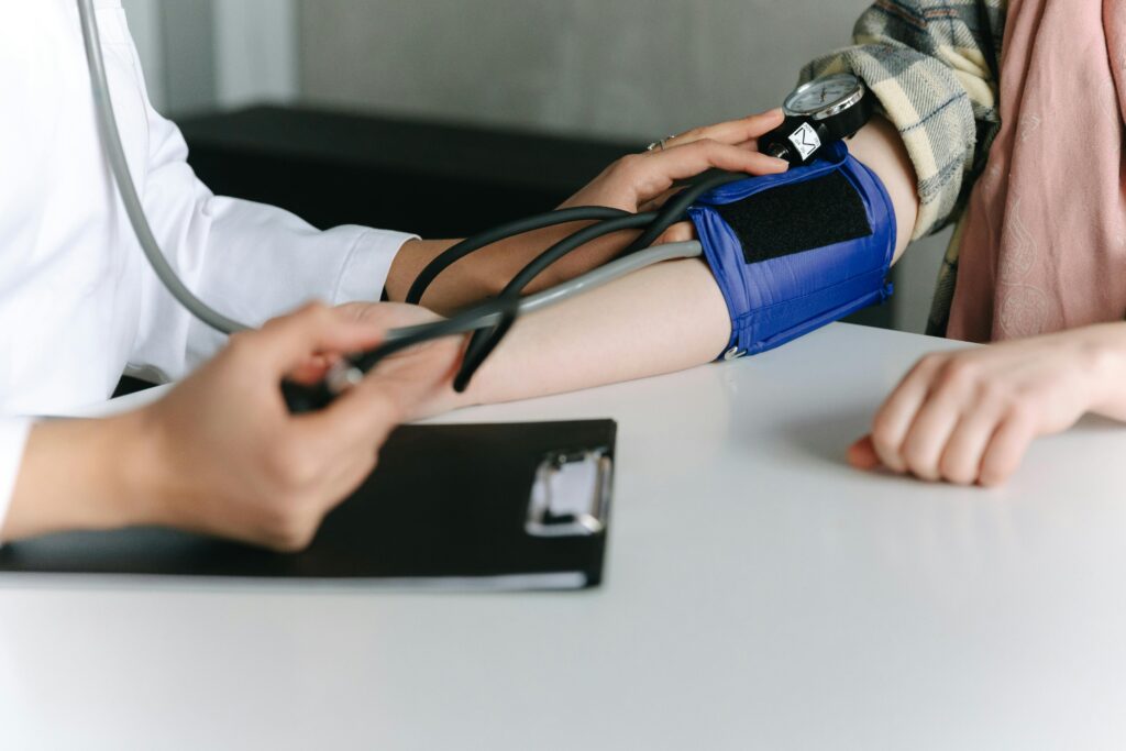 Blood pressure cuff on a person's arm