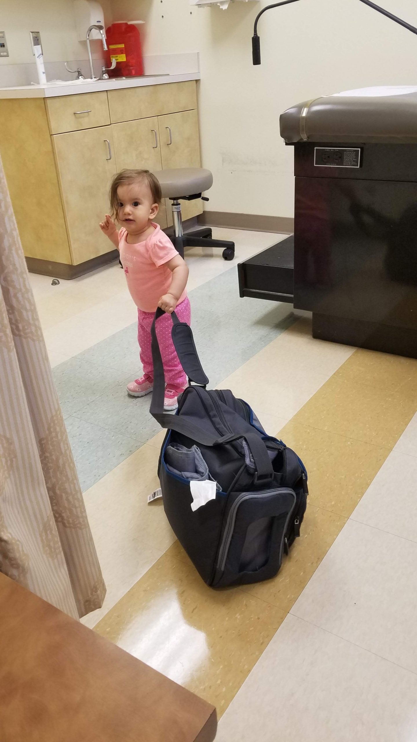 Mama Rissa's daughter at the doctor.