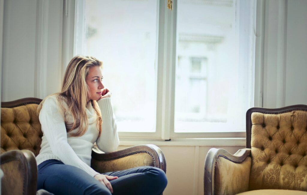 Woman looking out the window